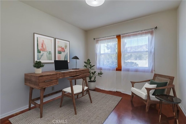 office with wood finished floors and baseboards