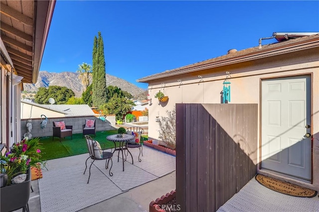 view of patio featuring a mountain view