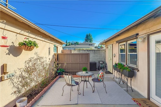 view of patio / terrace with fence