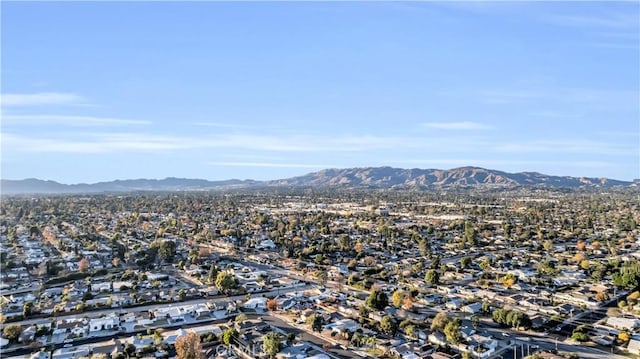 drone / aerial view with a residential view and a mountain view