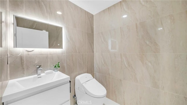 half bath featuring toilet and vanity