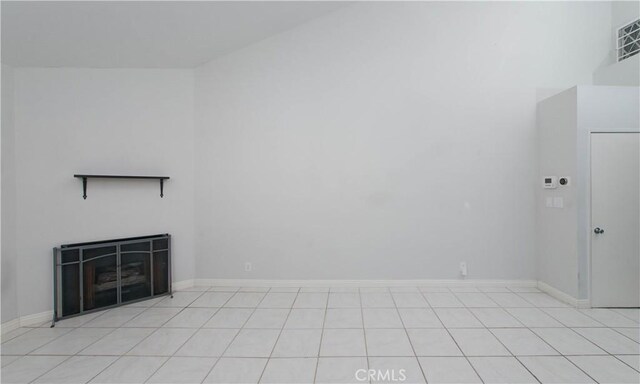 interior space featuring visible vents, a fireplace, and baseboards