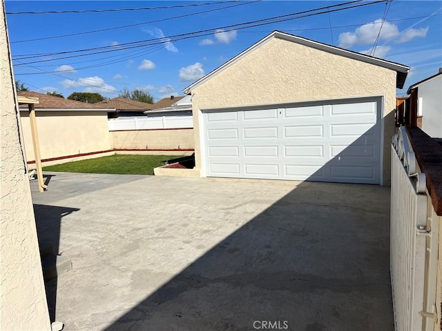 detached garage with fence