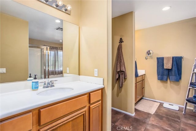 31255 Nice Ave, Mentone, CA 92359 - full bath featuring vanity, a shower with shower door, baseboards, and recessed lighting