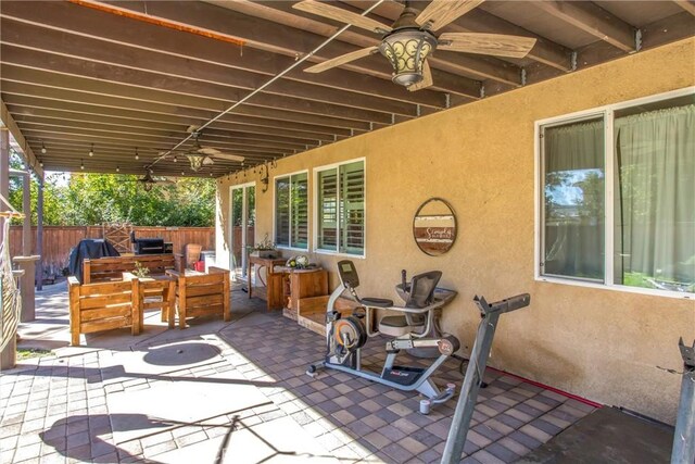 31255 Nice Ave, Mentone, CA 92359 - view of patio featuring fence, ceiling fan, and outdoor lounge area