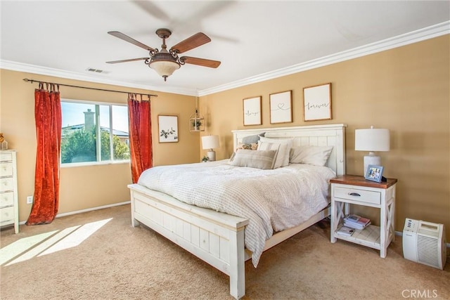 bedroom with ornamental molding, carpet, and visible vents