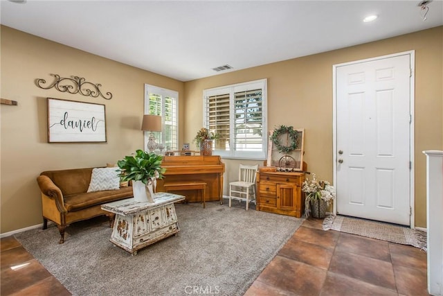 sitting room featuring recessed lighting, visible vents, and baseboards