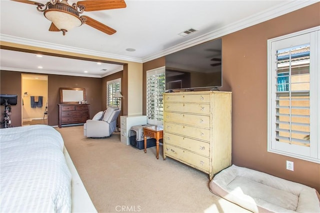 bedroom with crown molding, recessed lighting, visible vents, and light colored carpet