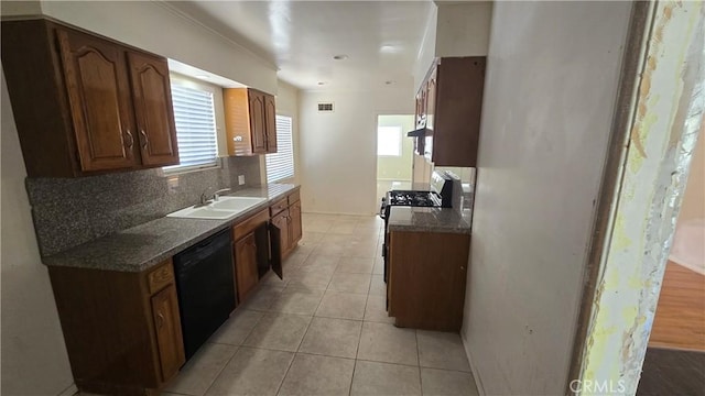 kitchen with light tile patterned floors, visible vents, decorative backsplash, a sink, and dishwasher