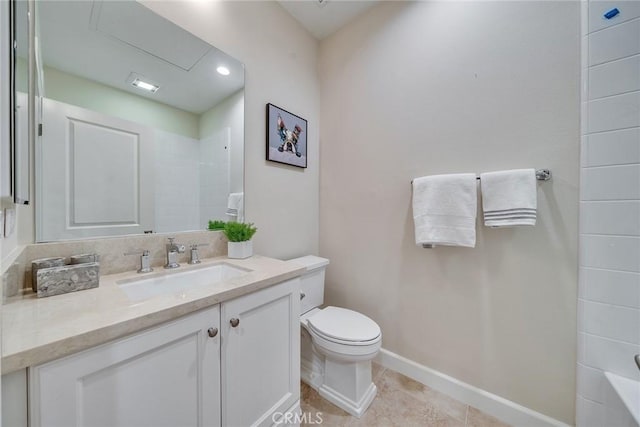 full bathroom with toilet, tile patterned floors, baseboards, and vanity