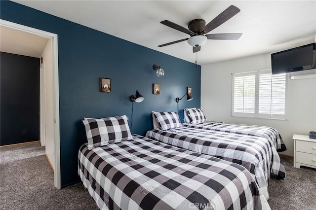 bedroom with carpet and a ceiling fan