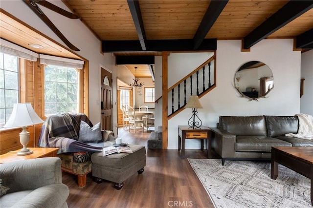 living area with wood ceiling, stairway, beam ceiling, and wood finished floors