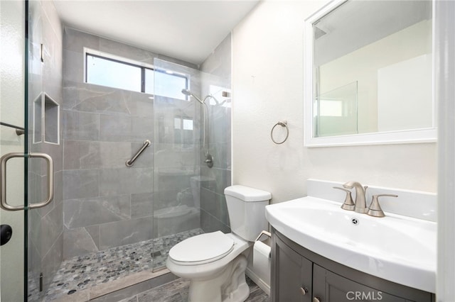 3635 Sierra Cir Unit 22, West Covina, CA 91792 - bathroom with vanity, a shower stall, and toilet