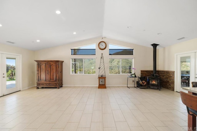 39255 De Luz Rd, Fallbrook, CA 92028 - living area with a wood stove, vaulted ceiling, healthy amount of natural light, baseboards, and recessed lighting