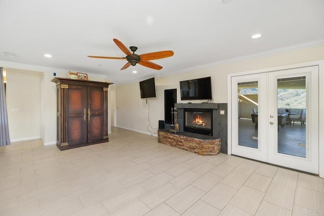 39255 De Luz Rd, Fallbrook, CA 92028 - unfurnished living room featuring french doors, a ceiling fan, ornamental molding, baseboards, and a glass covered fireplace