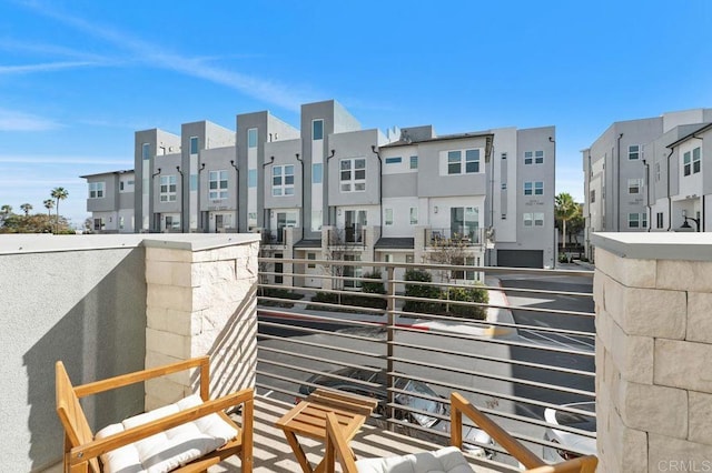 balcony featuring a residential view