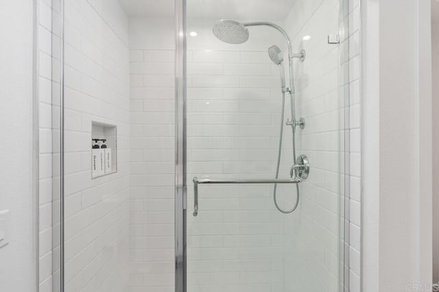 bathroom featuring a stall shower