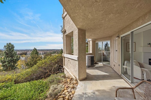 view of patio with central AC