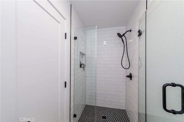 bathroom featuring a stall shower