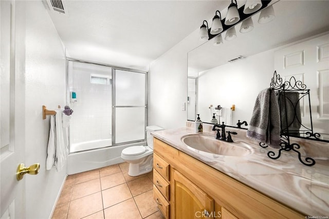 full bath with tile patterned floors, visible vents, toilet, and vanity