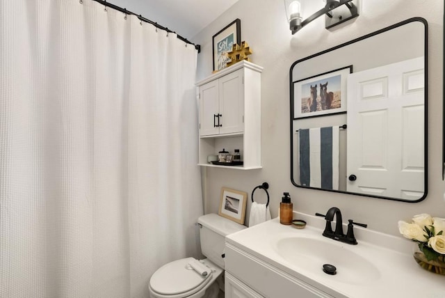 full bath with vanity and toilet