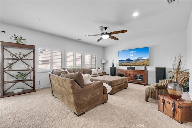 carpeted living room featuring recessed lighting, visible vents, and ceiling fan