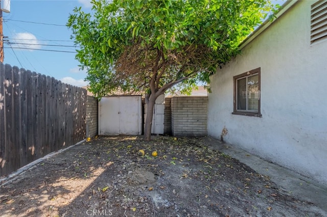 garage featuring fence