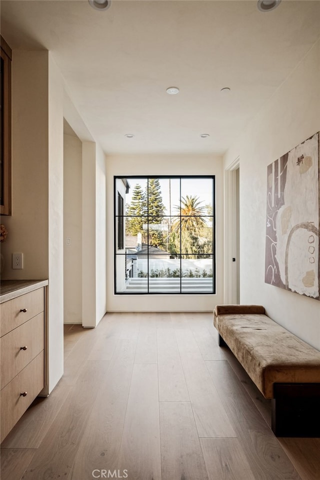 unfurnished room with light wood-type flooring and recessed lighting