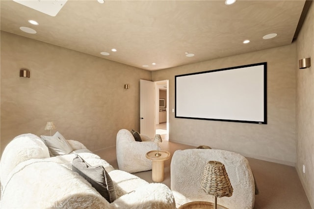 cinema room featuring recessed lighting and a skylight