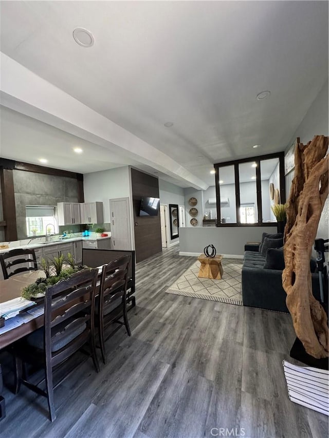 living area featuring dark wood-style floors