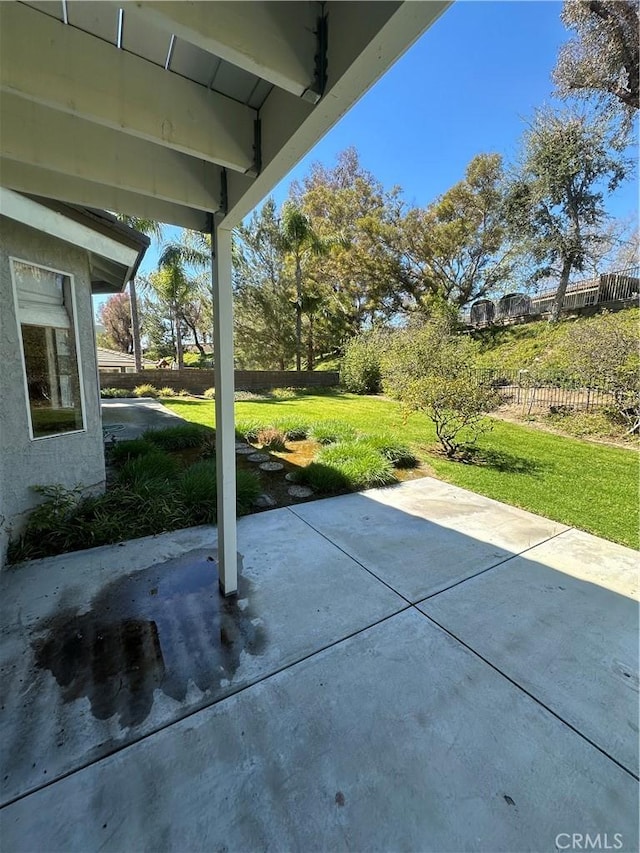 view of patio with fence