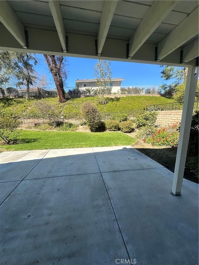 view of patio / terrace with fence