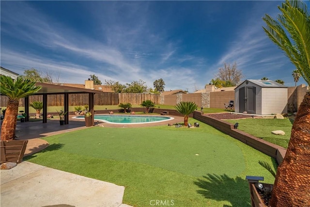 18218 Otilla St, Bloomington, CA 92316 - view of yard with a fenced backyard, a patio, a storage shed, and an outdoor structure