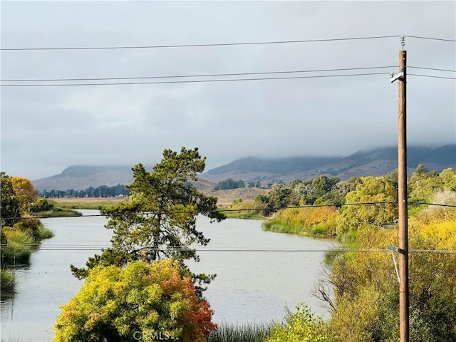 property view of water featuring a mountain view