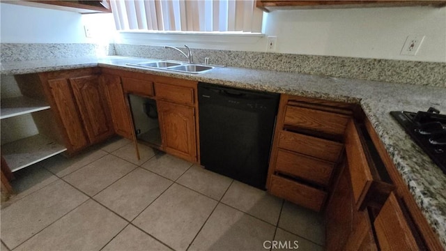 kitchen featuring light tile patterned floors, black dishwasher, brown cabinets, and a sink