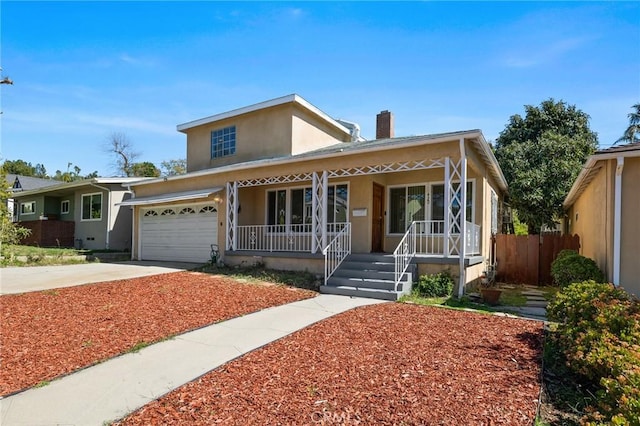 view of front of property with a chimney, stucco siding, a porch, an attached garage, and driveway