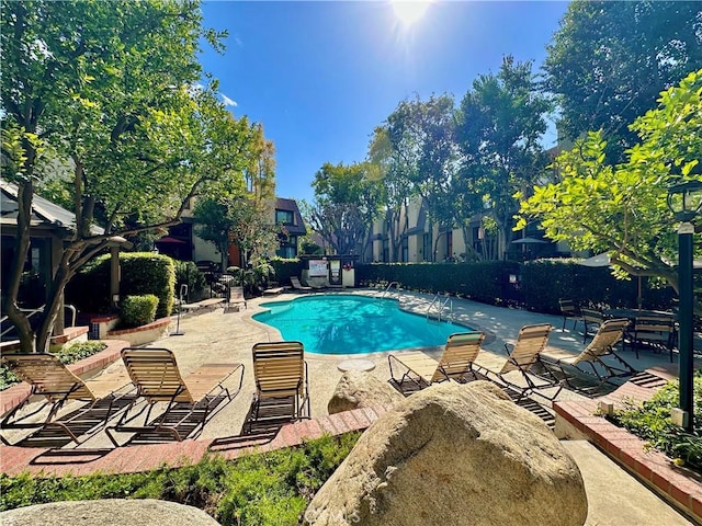 community pool featuring a patio