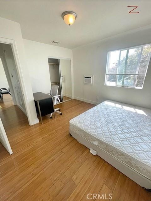 1238 W 35th St, Los Angeles, CA 90007 - bedroom featuring light wood finished floors and baseboards