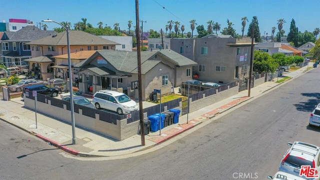1238 W 35th St, Los Angeles, CA 90007 - view of property with a residential view and fence