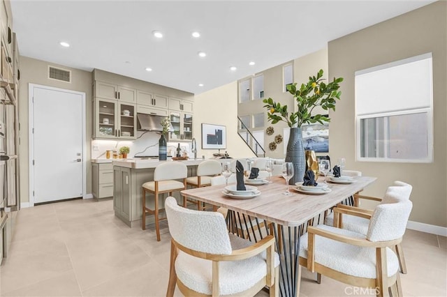 dining room featuring baseboards, visible vents, and recessed lighting