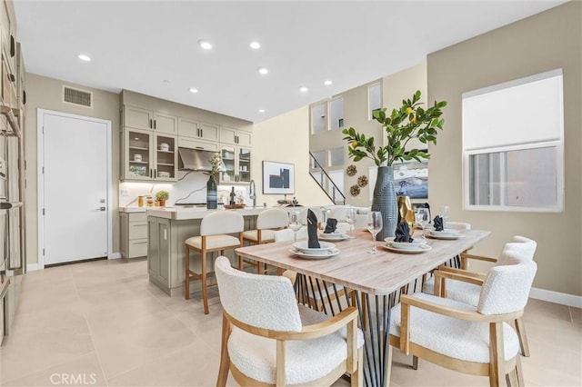 1155 Poppy Ct, Montebello, CA 90640 - dining room featuring recessed lighting, light tile patterned floors, and baseboards