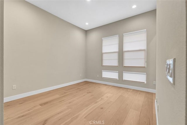 1155 Poppy Ct, Montebello, CA 90640 - unfurnished room with light wood-style flooring, baseboards, and recessed lighting