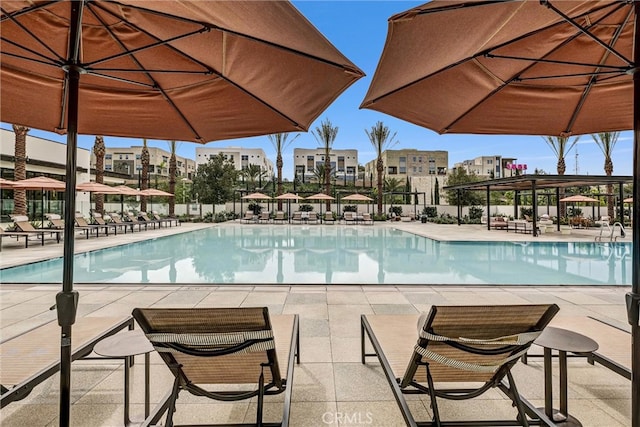 pool with a patio area