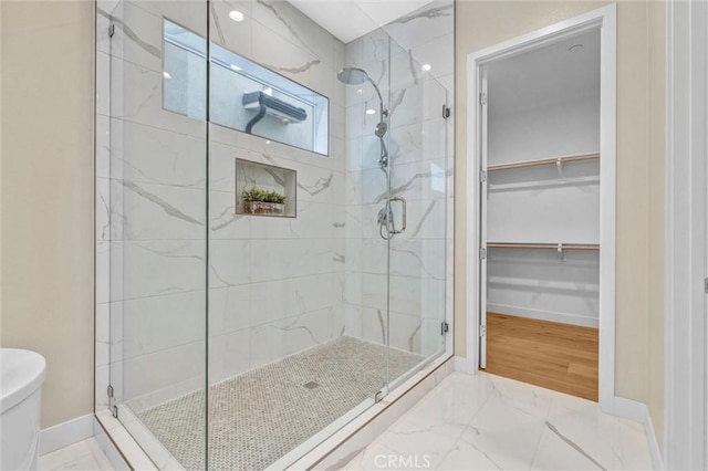1155 Poppy Ct, Montebello, CA 90640 - full bathroom with a shower stall, baseboards, toilet, and marble finish flooring