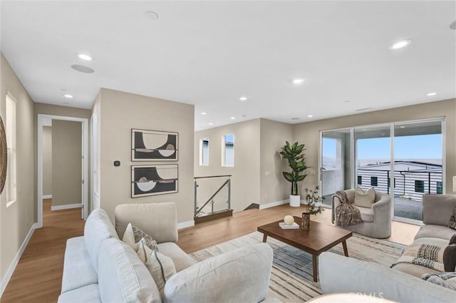 1155 Poppy Ct, Montebello, CA 90640 - living area with baseboards, light wood-style flooring, and recessed lighting