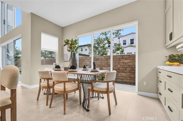 dining room with baseboards