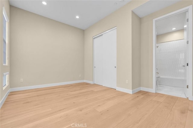 1155 Poppy Ct, Montebello, CA 90640 - unfurnished bedroom featuring light wood-style floors, recessed lighting, baseboards, a closet, and ensuite bath