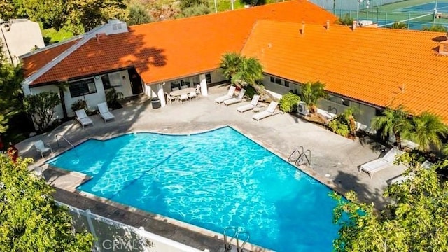 pool featuring a patio area