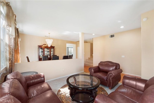 living area featuring stairway, recessed lighting, visible vents, and baseboards