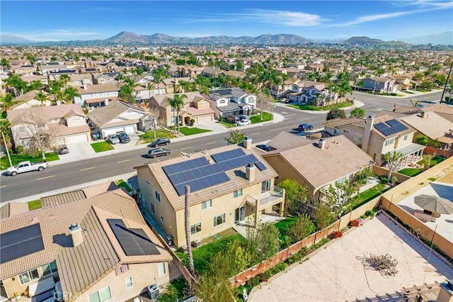 bird's eye view with a residential view and a mountain view